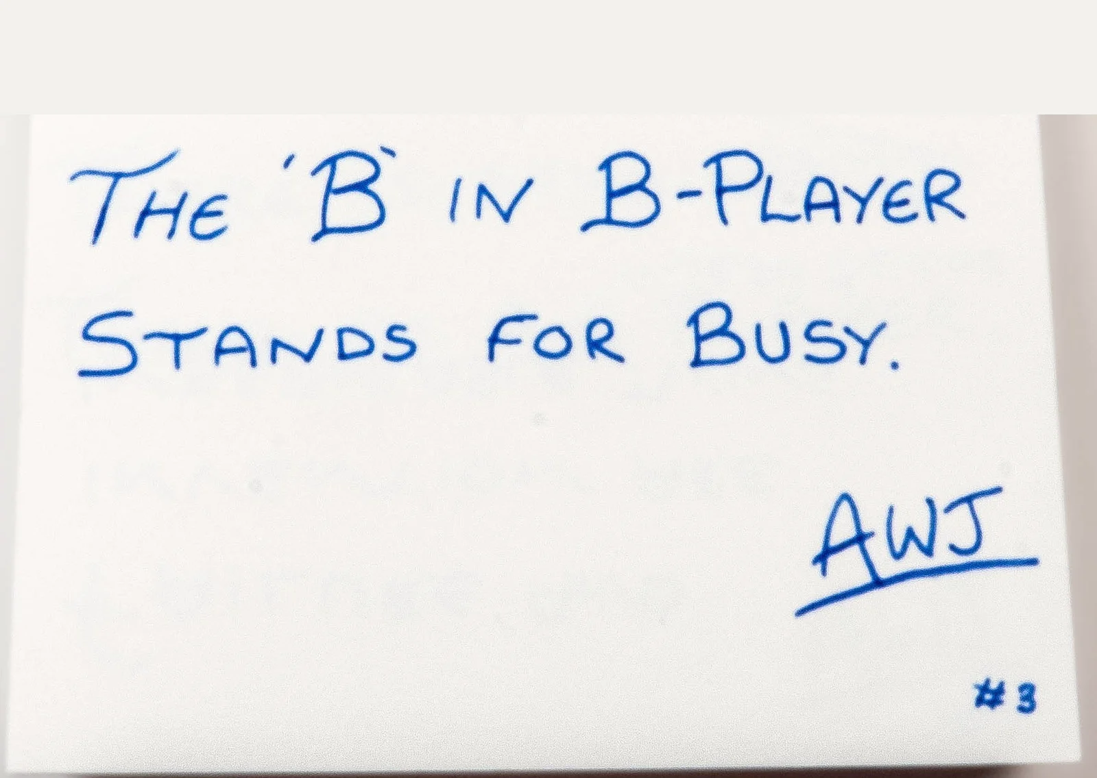 Handwritten in blue ink: The B in B-Player stands for Busy. Signed AWJ, number 3.