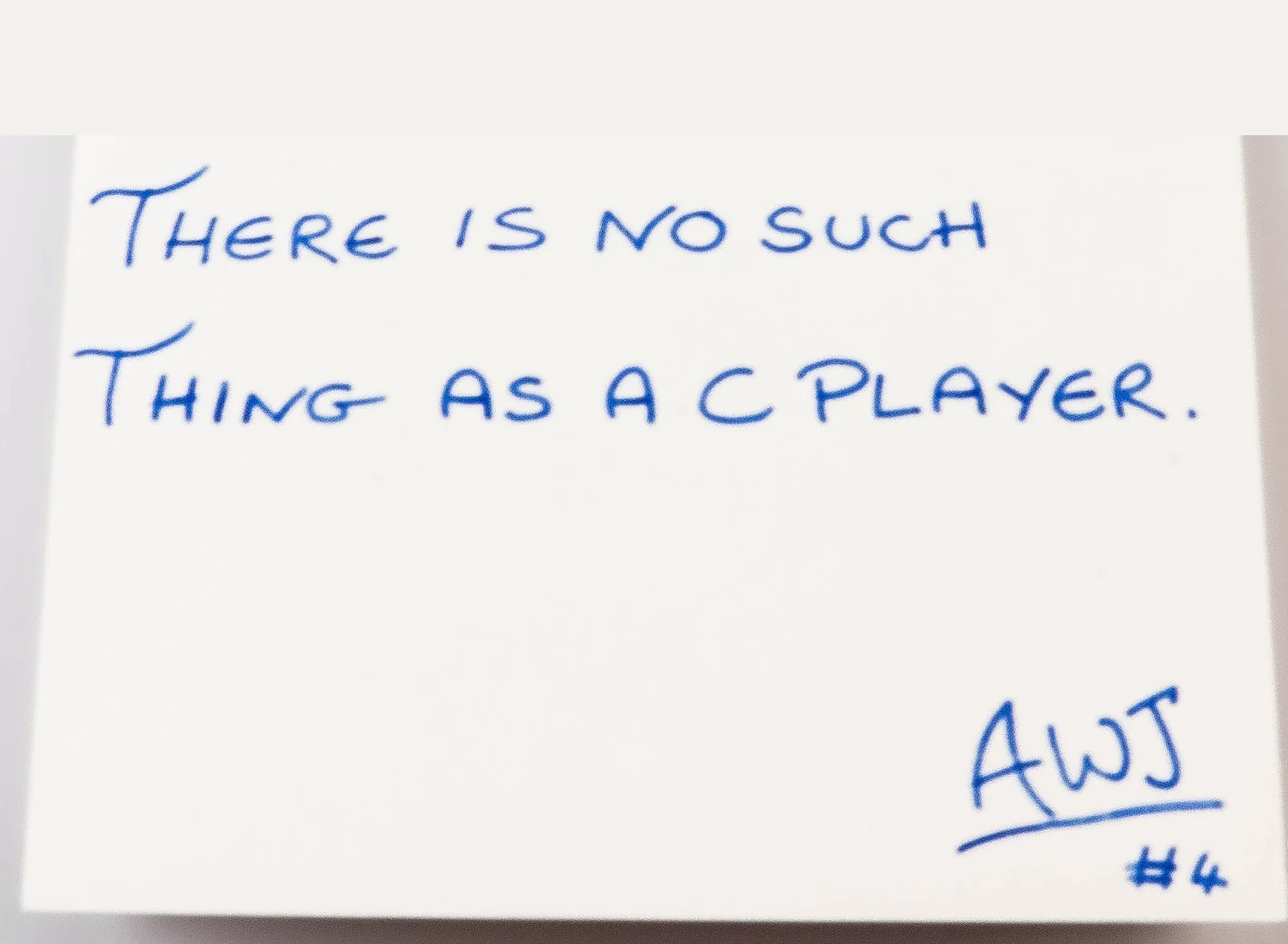 Handwritten in blue ink: There is no such thing as a C Player. Signed AWJ, number 4.