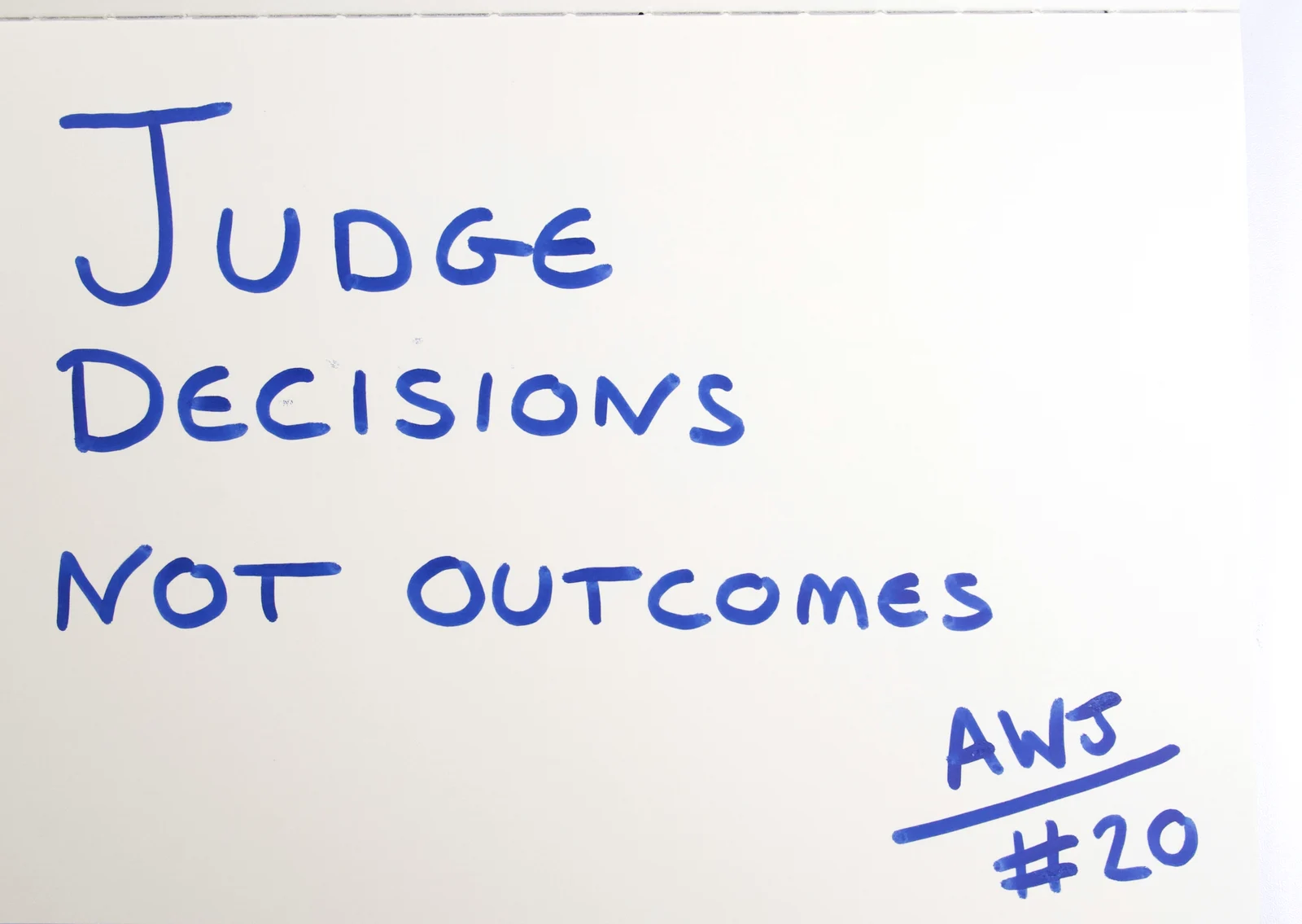 Handwritten in blue ink: Judge decisions, not outcomes. Signed AWJ, number 20.